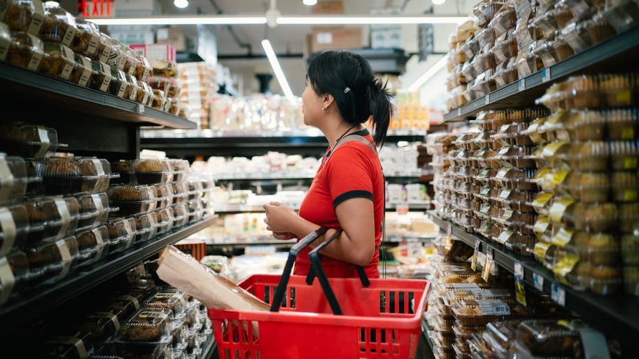 A woman buying groceries