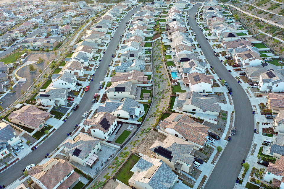 SANTA CLARITA, CALIFORNIA - SEPTEMBER 08: Aerial view of housing development on September 8, 2023 in Santa Clarita, California.  According to the National Association of Realtors, the median available home price in the US increased 1.9 percent in July after five straight months of decline, the longest period of decline in years 11, among the highest interest rates.  (Photo by Mario Tama/Getty Images)