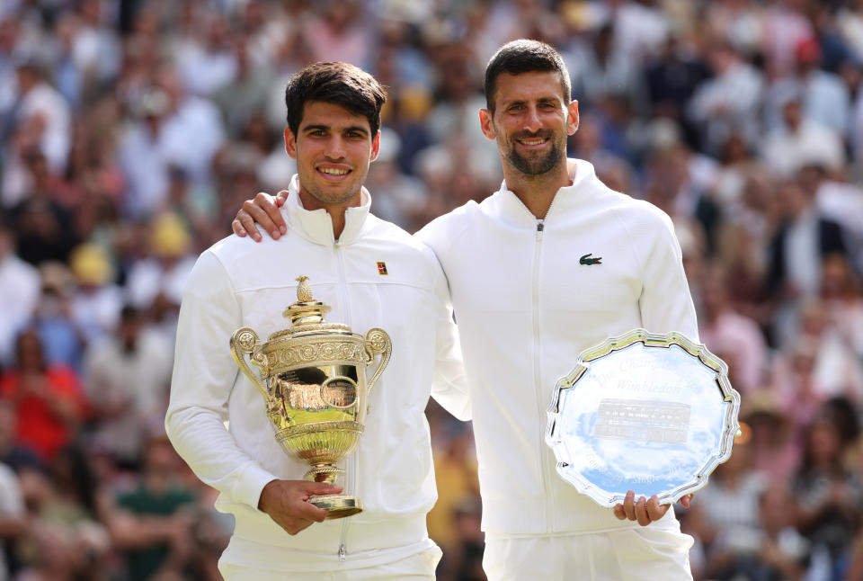 Alcaraz and Djokovic after the Wimbledon match last month.  (Clive Brunskill/Getty Images)