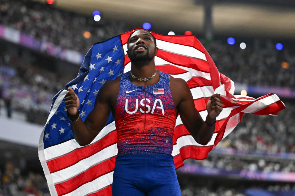 Noah Lyles of the USA celebrates after winning the men's 100m final at the Paris 2024 Olympic Games at the Stade de France in Saint-Denis, north of Paris, on August 4, 2024. (Photo by Jewel SAMAD / AFP) ( (Photo by JEWEL SAMAD/AFP via Getty Images)