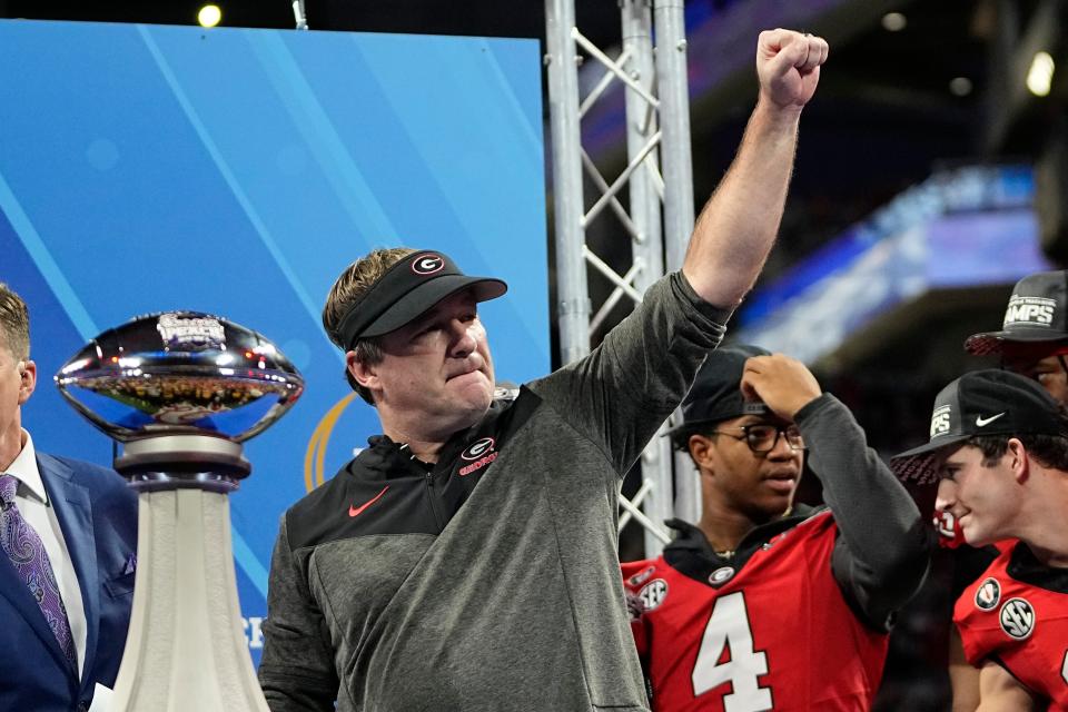 December 31, 2022;  Atlanta, Georgia, USA;  Georgia Bulldogs head coach Kirby Smart delivers a fist pump following the Peach Bowl against the Ohio State Buckeyes in the College Football Playoff semifinal game at Mercedes-Benz Stadium.  Georgia beat Ohio State 42-41.  Mandatory Credit: Adam Cairns-The Columbus Dispatch Ncaa Football Peach Bowl Ohio State At Georgia