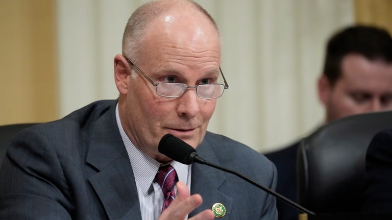 Rep.  John Moolenaar, R-Mich., questions witnesses during the hearing about...