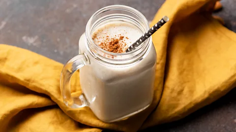 Getty Images Milkshake with straw on yellow linen (Credit: Getty Images)