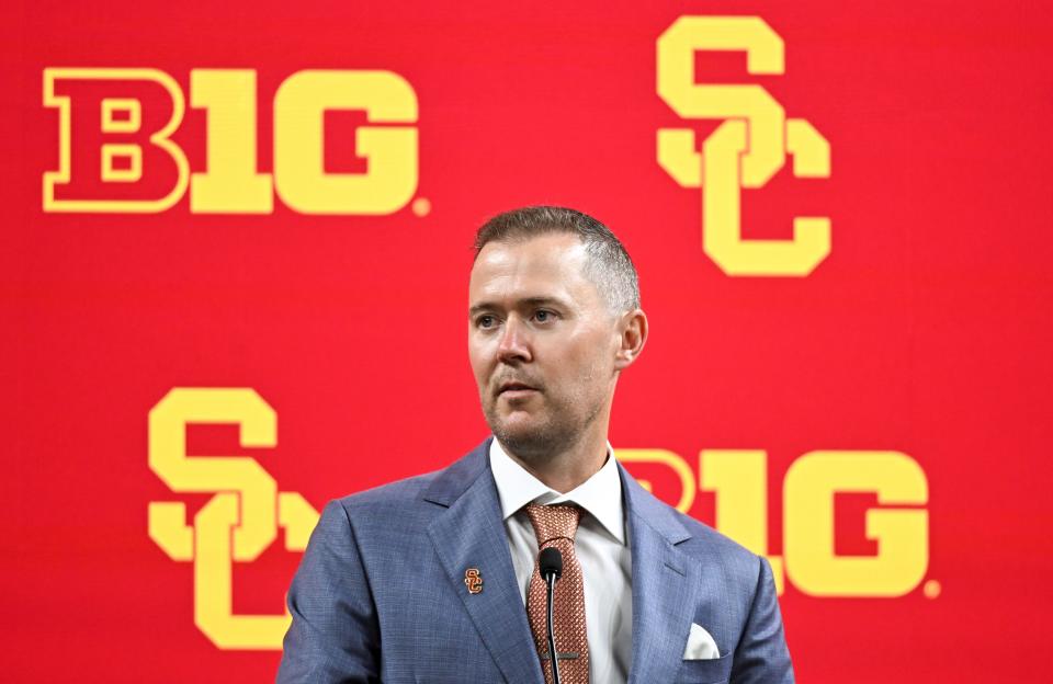 July 24, 2024;  Indianapolis, IN, USA;  USC Trojans head coach Lincoln Riley speaks to the media during the Big 10 football media day at Lucas Oil Stadium.  Mandatory Credit: Robert Goddin-USA TODAY Sports